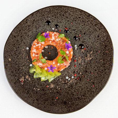 Salmon tartare on a plateの写真素材