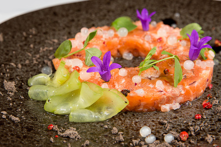 Salmon tartare on a plateの写真素材