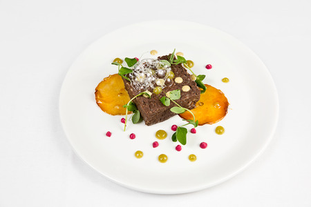 roasted wild boar pate with candied applesの写真素材