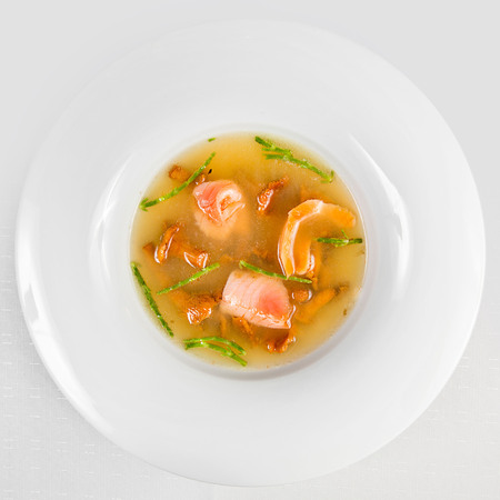 Tasty Salmon soup with mushroomsの写真素材