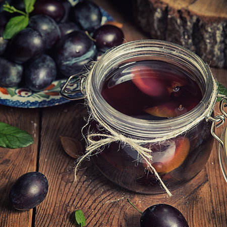 Plum compote in jarの写真素材