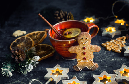 Christmas tea with spice and gingerbread cookie