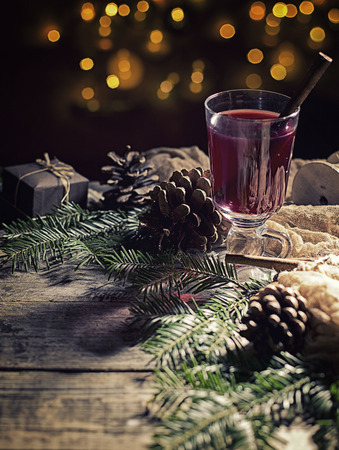 Hot tasty spicy mulled red wine with cinnamonの写真素材