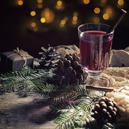 Hot tasty spicy mulled red wine with cinnamonの写真素材