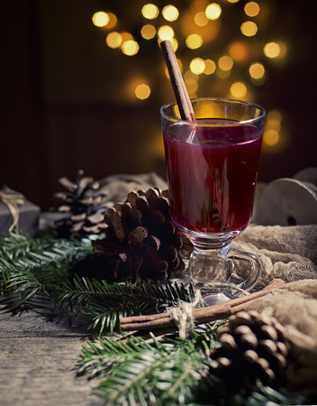 Hot tasty spicy mulled red wine with cinnamonの写真素材