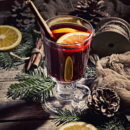 Hot tasty spicy mulled red wine with orange and cinnamon christmasの写真素材