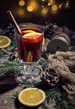 Hot tasty spicy mulled red wine with orange and cinnamon christmasの写真素材