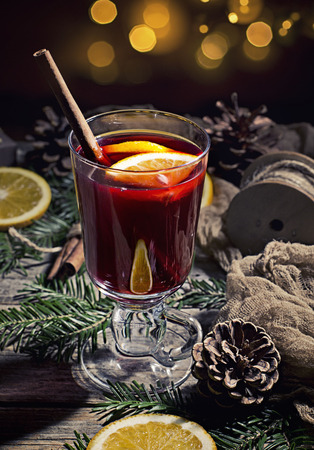 Hot tasty spicy mulled red wine with orange and cinnamon christmasの写真素材