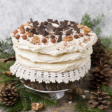 Meringue Cake Pavlova with cream and nutsの写真素材