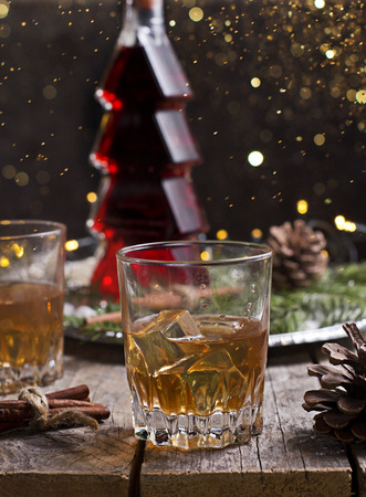 Whiskey, brandy or liquor in christmas timeの写真素材