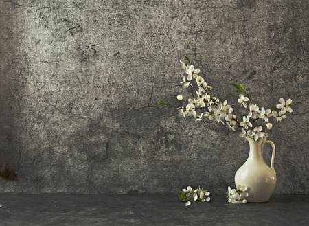 blossom apple tree in vase on dark backgroundの写真素材