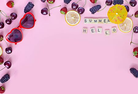 Top view of round frame made of summer fruitsの写真素材