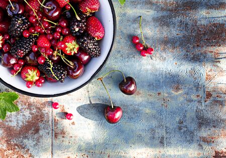 Fresh berries in a bowl. summer timeの写真素材