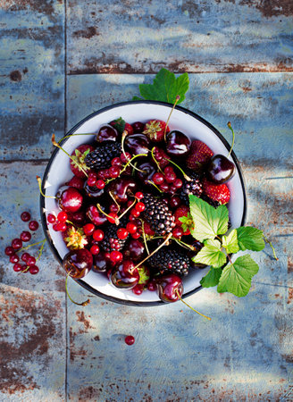 Fresh berries in a bowl. summer timeの写真素材