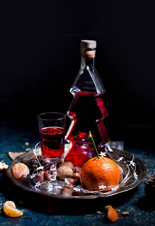 red wine in a Christmas tree-shaped bottleの写真素材