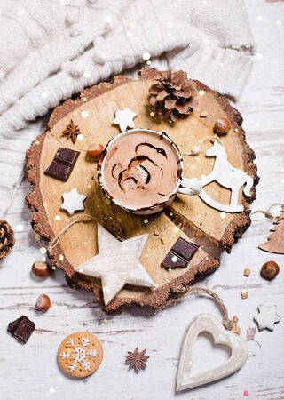 Christmas hot chocolate, decor with nuts, spicesの写真素材