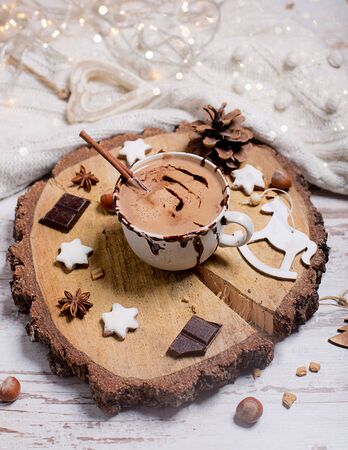 Christmas hot chocolate, decor with nuts, spicesの写真素材