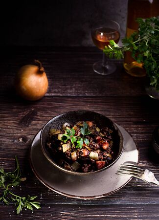 blood sausage with onion and parsleyの写真素材