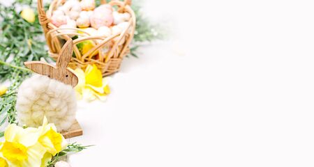Easter background with eggs and flowers. Template for textの写真素材