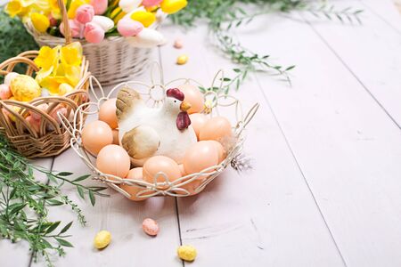 Easter background with eggs and flowers. Template for textの写真素材