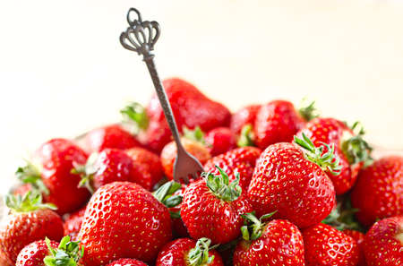 reds beautiful and juicy harvested strawberriesの写真素材
