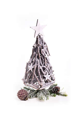 natural wooden christmas tree on white backgroundの写真素材