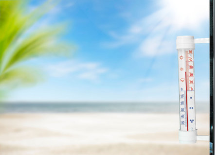 Summer beach thermometer and free space for your textの写真素材