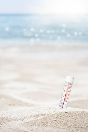 Summer beach thermometer and free space for your textの写真素材