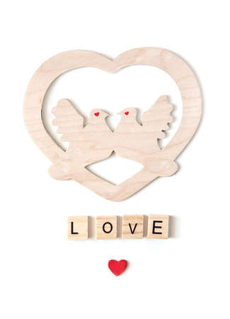 Red hearts and "Love" text on white background.の写真素材