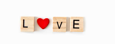 Red hearts and "Love" text on white background.の写真素材