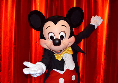 Paris - France, Circa June, 2013. Mickey Mouse making one of his poses in the Meet Mickey Mouse pavilion in Disney Paris. Mickey mouse was created by Walt Disney in 1928. Photo taken June, 2013のeditorial素材