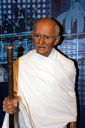 London, - United Kingdom, 08, July 2014. Madame Tussauds in London.  Waxwork statue of Mohandas Karamchand Gandhi. Created by Madam Tussauds in 1884, Madam Tussauds is a waxwork museum.のeditorial素材
