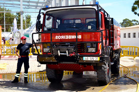 Portugal, Algarve, Lagoa, Circa 04.06.2017. Brand new Fire engine being displayed in a local international fair. There are many forest fires in Portugal every year.のeditorial素材