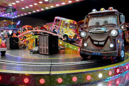 Portugal, Algarve, Portimao. Circa November 2017. Carousel cars ride in a carnival in Portugal.のeditorial素材