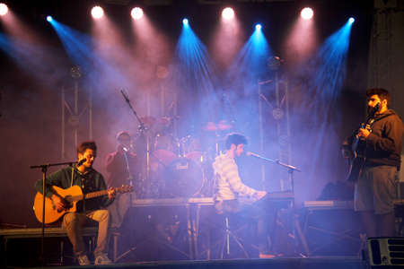 Monchique, Algarve, Portugal. Circa March 2016. Portuguese Band  Atoa playing in a traditional sausage  festival in Monchique.  Atoa are a Portuguese band who play rock and pop from the city of Evora.  Joao, Rodrigo and Mのeditorial素材