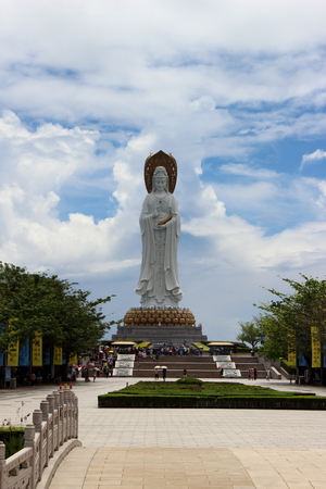 Sanya, Hainan, China - September 29, 2017: a crowd of Chinese tourists at the base of the statue of the goddess Guanyin in Nanshan Buddhist Cultural Centreのeditorial素材