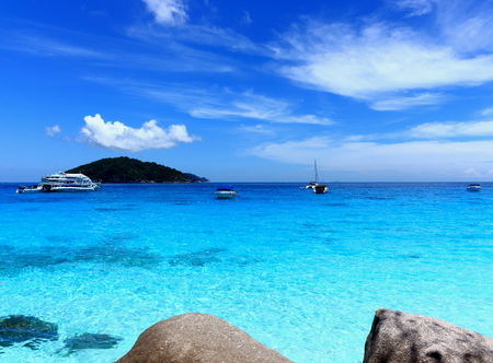 Amazing idyllic marine tropical landscape with bright azure clear water and blue sky with perfect...