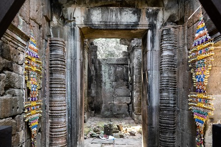 Inside ancient Khmer temple of Prasat Krol Ko in Angkor Wat complex at Siem Reap, Cambodia.の写真素材
