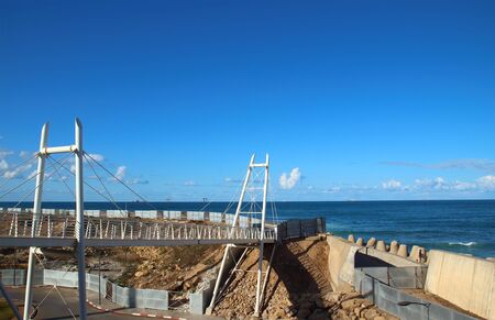 View of the cable-stayed footbridge leading to the magnificent Atlantic Ocean in Casablanca, Moroccoの写真素材