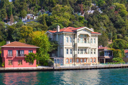 Istanbul, Turkey - October 6, 2019: Landscape with cozy houses on the coastline of the Bosphorus straitのeditorial素材