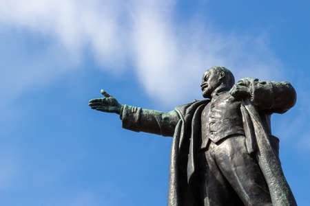 Saint Petersburg, Russia - 14 August, 2020: View of the monument to Vladimir Lenin against blue sky. Symbols of communism. Leader of the revolution with raised hand pointing direction.のeditorial素材