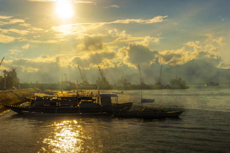 Majestic evening landscape on Puerto Princesa promenade on Palawan island, Philippines. Golden...