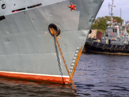 Waterline of a naval ship with depth (draft) markings on hull. Load line mark and lines on the hull...