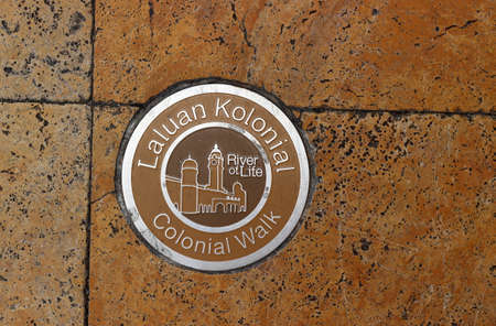 Kuala Lumpur, Malaysia - Mart 12, 2019: The yellow emblem of the walking route of Laluan Walk or...
