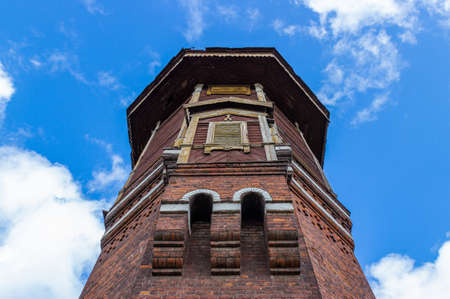 Fragment of a historical water-pressure tower against blue sky background. Location on the 4130 km of the Trans-Siberian Railway at Zykovo rail road station, Krasnoyarsk Krai, Russiaの写真素材