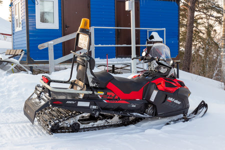 Krasnoyarsk, Russia - February 20, 2021: Mountain rescue snowmobile Ski-Doo on the ski slope.のeditorial素材