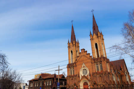 Transfiguration Church and Organ hall in Krasnoyarsk in Russia. Catholic church was built in neo-Gothic style in 1908-1911.の写真素材