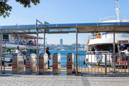 Istanbul, Turkey - October 10, 2019: Uskudar ferry station at the Bosphorus strait. Ferries go to...