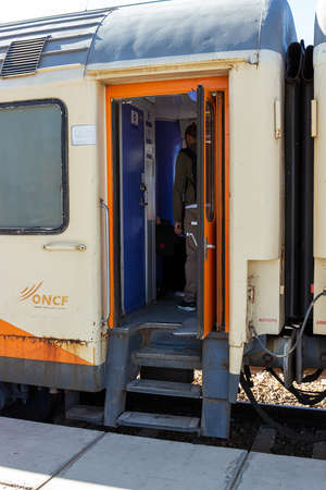 Casablanca, Morocco - 16 October, 2019: ONCF train with open door at passenger platform of the Casa-Voyageurs Railway Station in Casablanca, Moroccoのeditorial素材