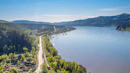 Sliznevo, Divnogorsk, Russia - June 1, 2021: View of the village Sliznevo and Yenisei river from the...